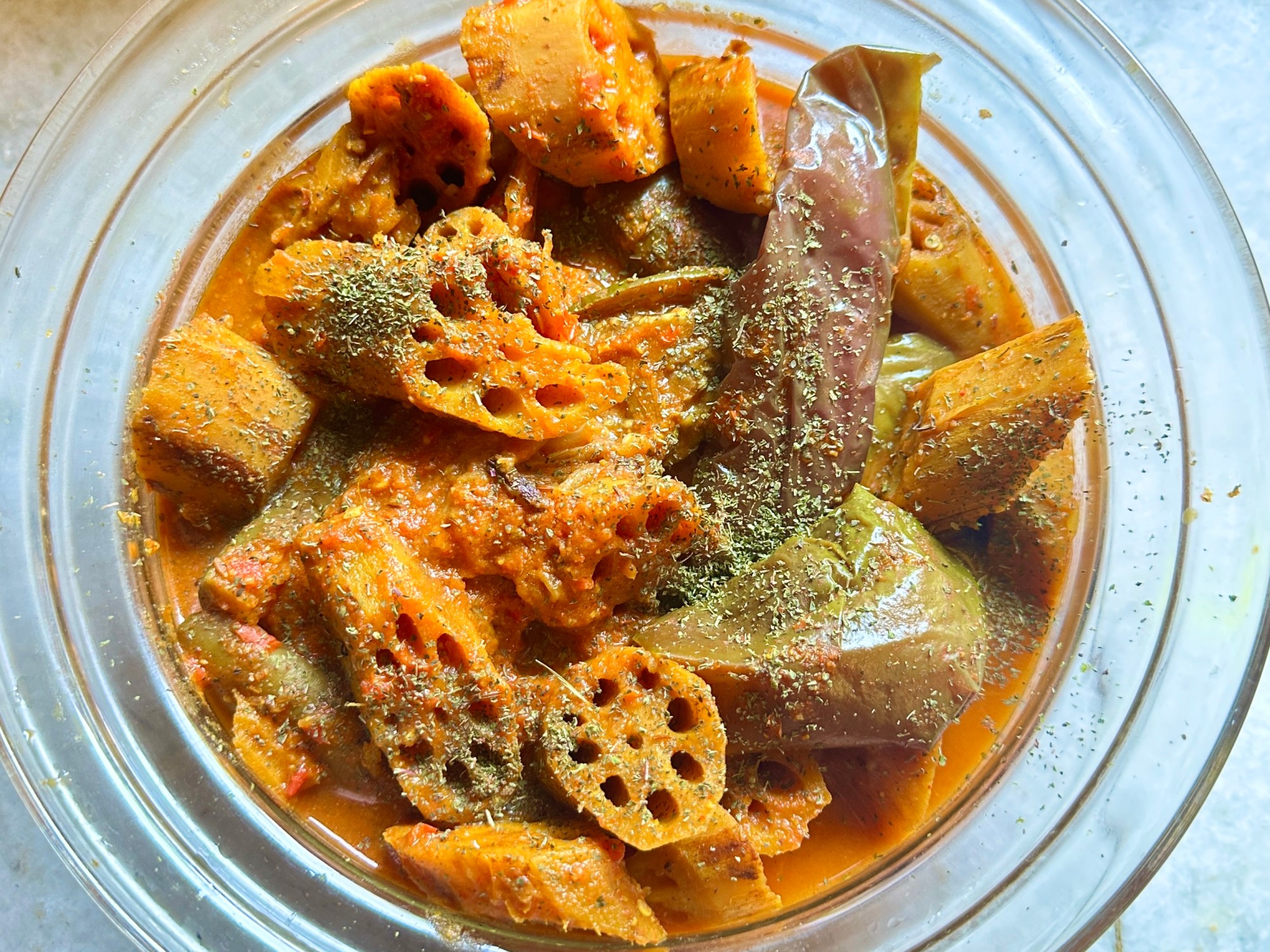 This dish is everything I love about Kashmiri cooking: it celebrates a lesser-known veggie (lotus root), relies on simple spices, and marries textures—crunchy nadru, silky eggplant—into soulful harmony.