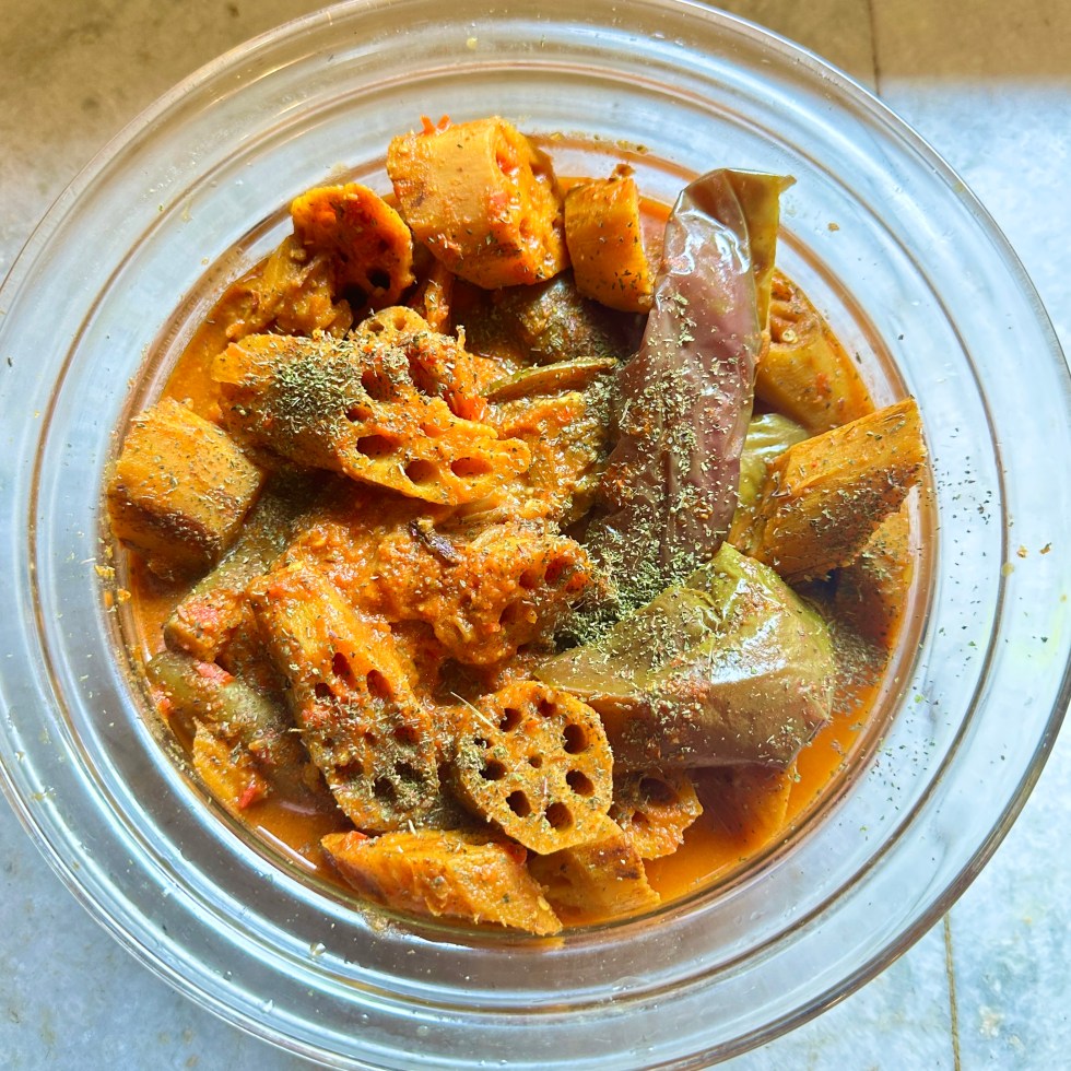 This dish is everything I love about Kashmiri cooking: it celebrates a lesser-known veggie (lotus root), relies on simple spices, and marries textures—crunchy nadru, silky eggplant—into soulful harmony.